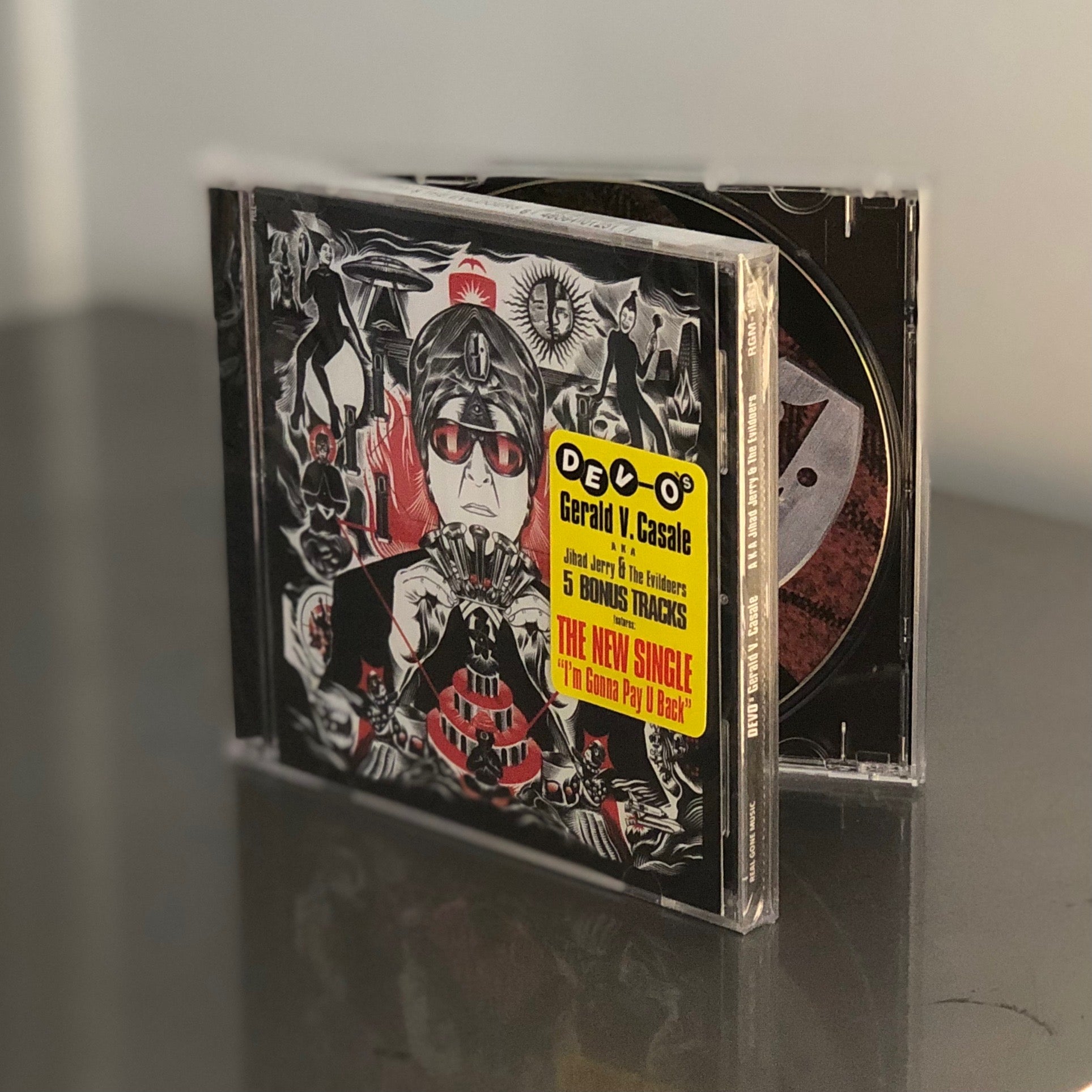 DELUXE EXPANDED CD: 5 BONUS TRACKS – DEVO's Gerald V. Casale
